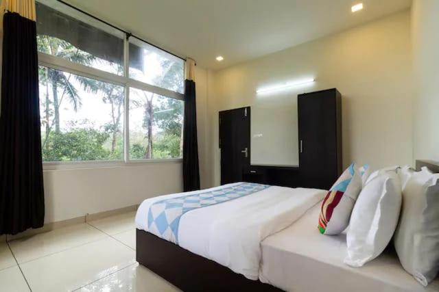 Letstay Vythiri Hill Palace Quarto foto
